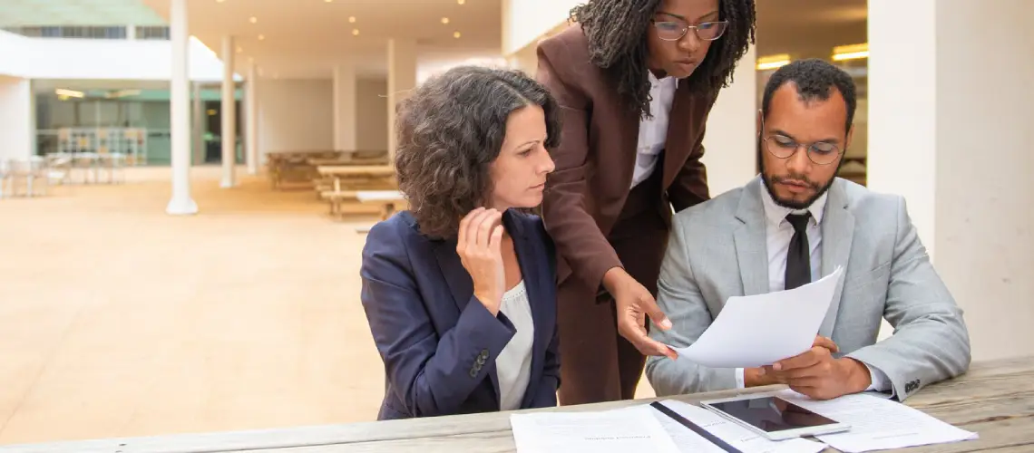Buyers and sellers reviewing property valuation report in ACT